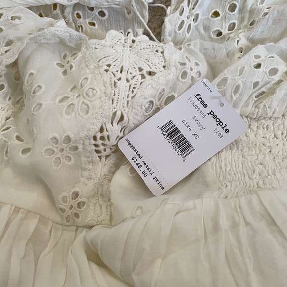 Lottie Dress in Ivory
Free People
XS - Picture 6 of 6